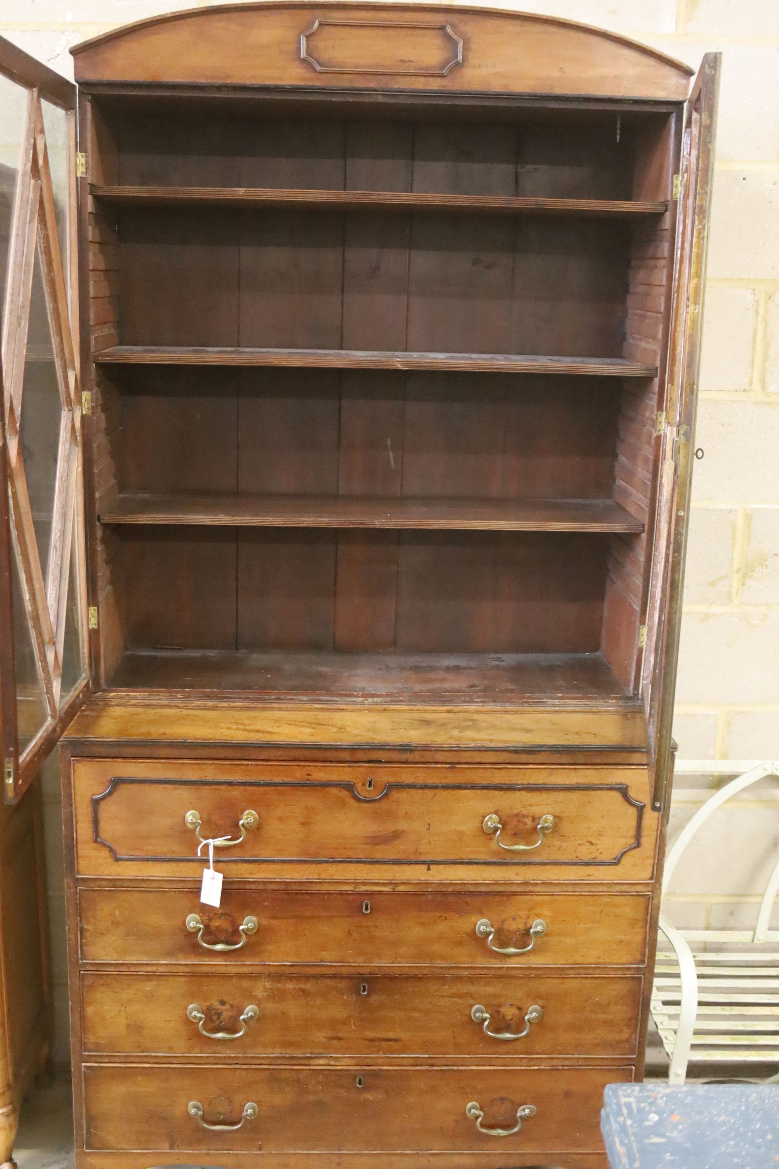 A Regency mahogany secretaire bookcase, length 107cm, depth 49cm, height 227cm